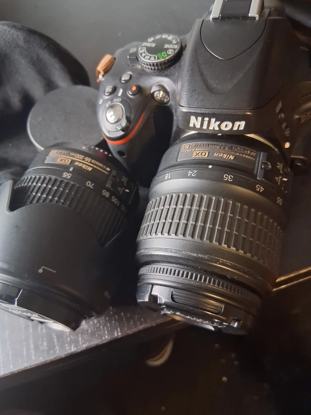 Nikon Black DSLR Body with Two Black DX Zoom Lenses